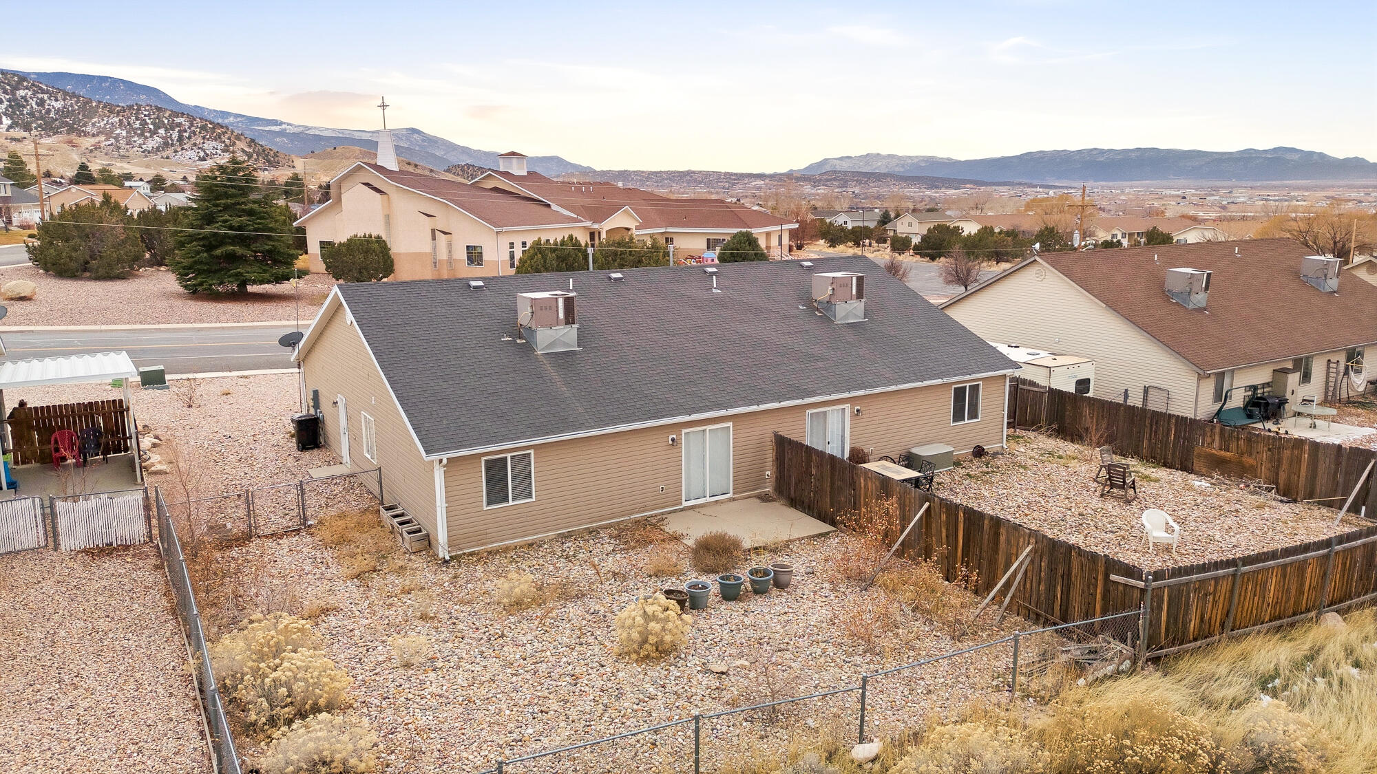 577-593 East Nichols Canyon Road, Unit 577579 & 591593 RV GARAGE Cedar City, UT 84721 - Photo 49 of 102 This unit features a fully fenced backyard and uncovered rear patio.
