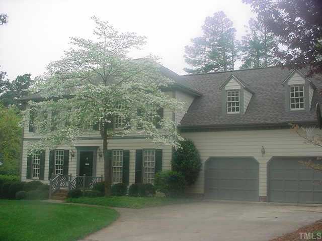 2133 Hamrick Drive Raleigh, NC 27615 - Photo 1 of 1 front view of a house with a garden