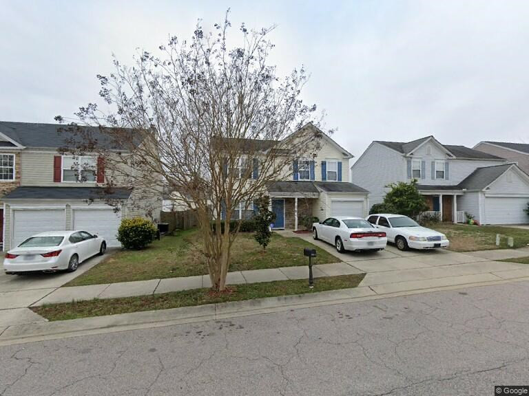 7412 Lowell Ridge Road Raleigh, NC 27616 - Photo 2 of 2 a view of a street that has couple of cars parked on the road