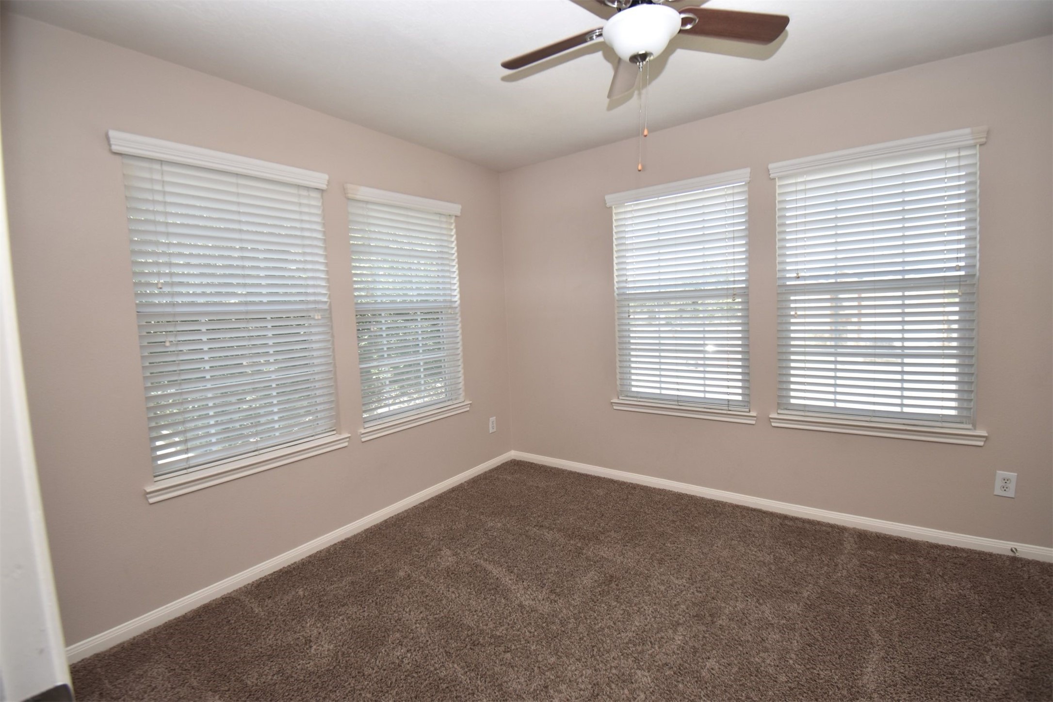 611 Chase More Court Bacliff, TX 77518 - Photo 10 of 20 a view of an empty room with a window