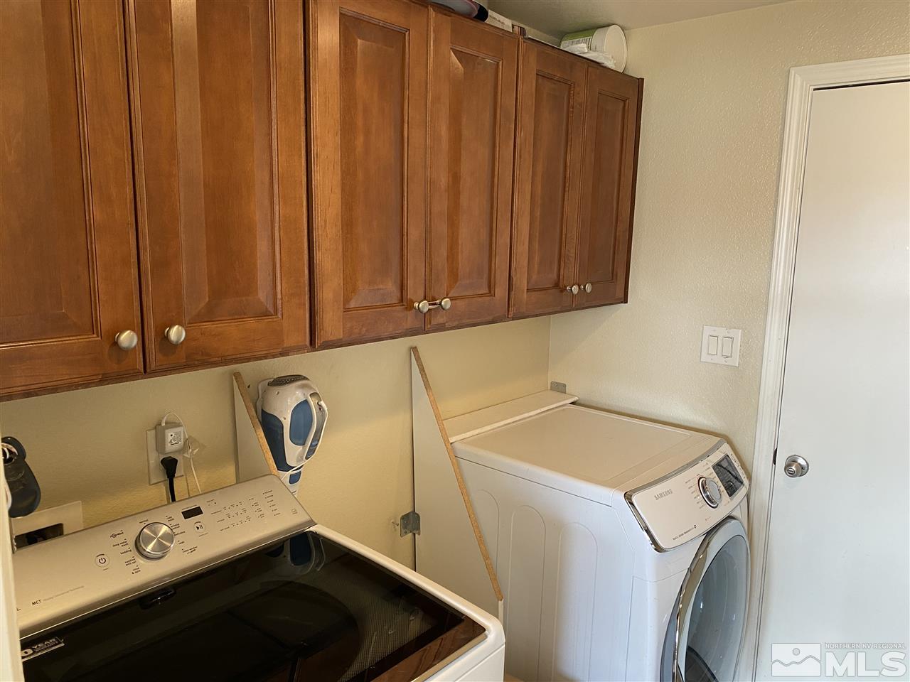 2150 Overland Road Reno, NV 89521 - Photo 17 of 19 a utility room with dryer and washer