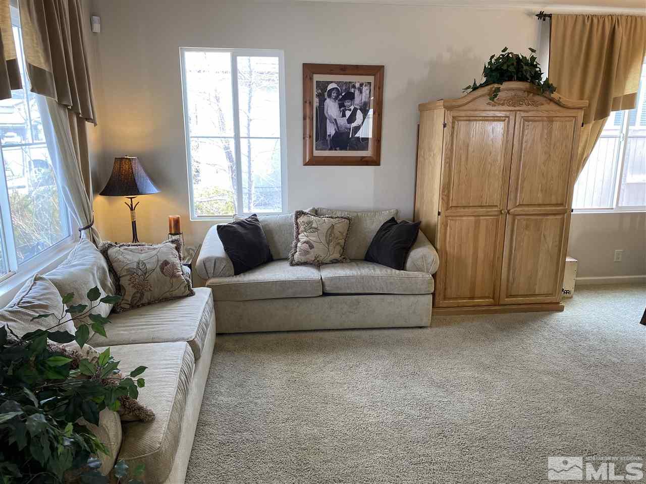 2150 Overland Road Reno, NV 89521 - Photo 3 of 19 a living room with furniture and a window
