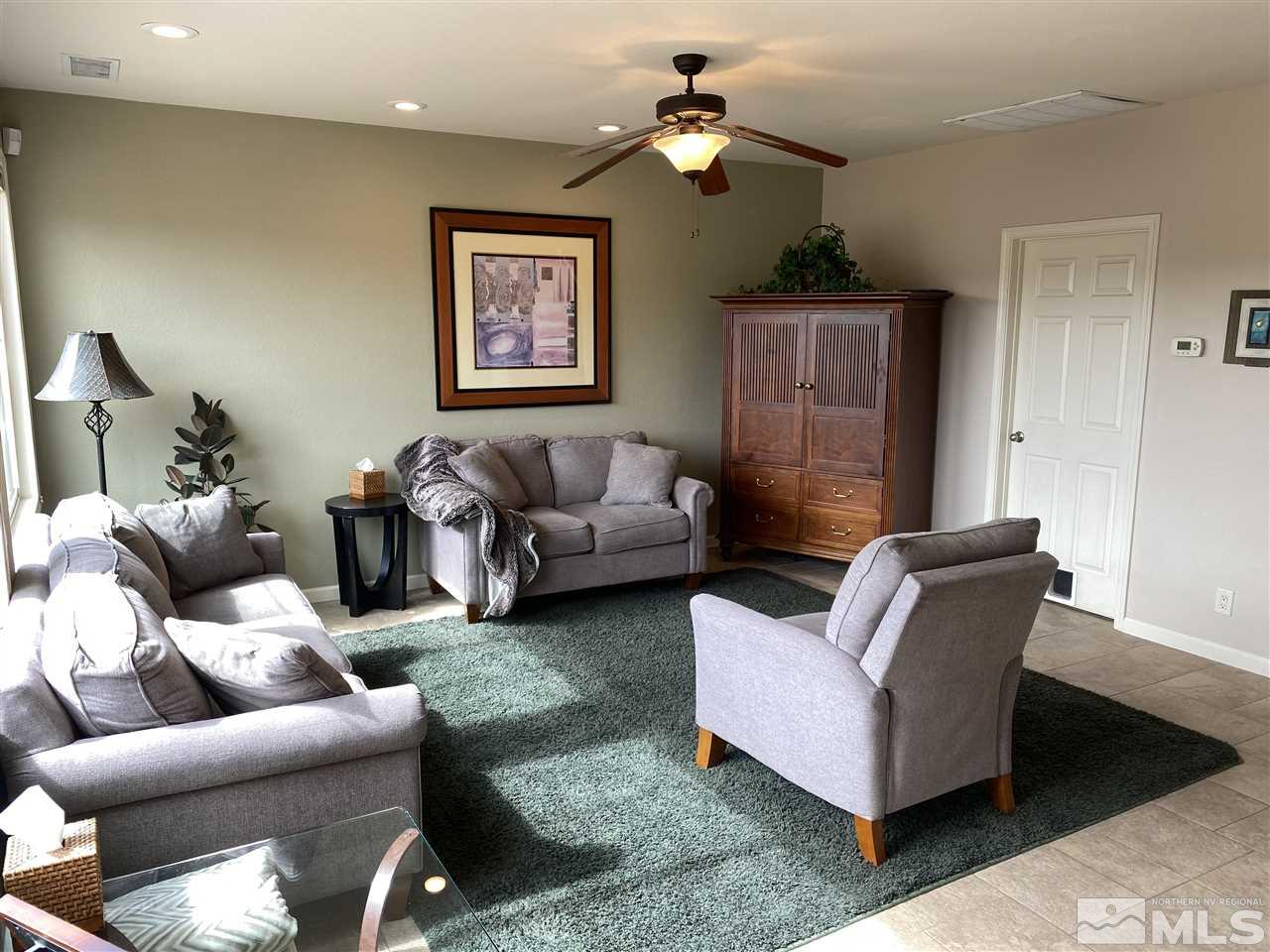2150 Overland Road Reno, NV 89521 - Photo 7 of 19 a living room with furniture and a window