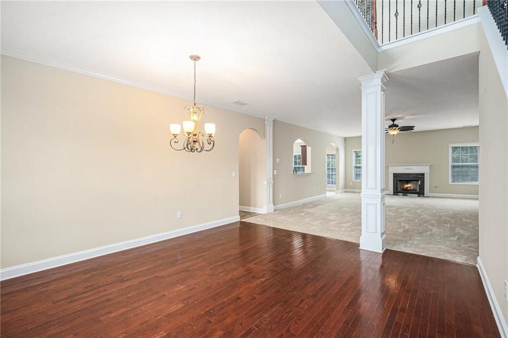 6054 Locklear Way Douglasville, GA 30134 - Photo 6 of 36 a view of a livingroom with wooden floor