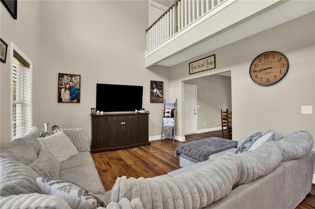 923 County Line Road Resaca, GA 30735 - Photo 14 of 49 a living room with furniture and a flat screen tv