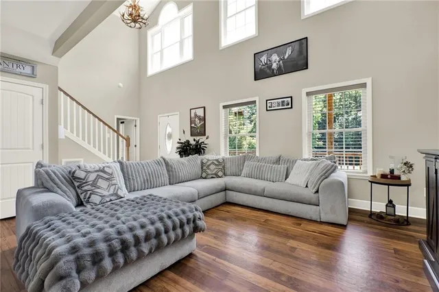 a living room with furniture and a table