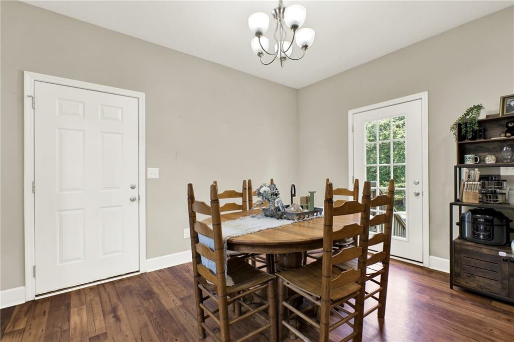 923 County Line Road Resaca, GA 30735 - Photo 21 of 49 a view of a dining room with furniture window and wooden floor