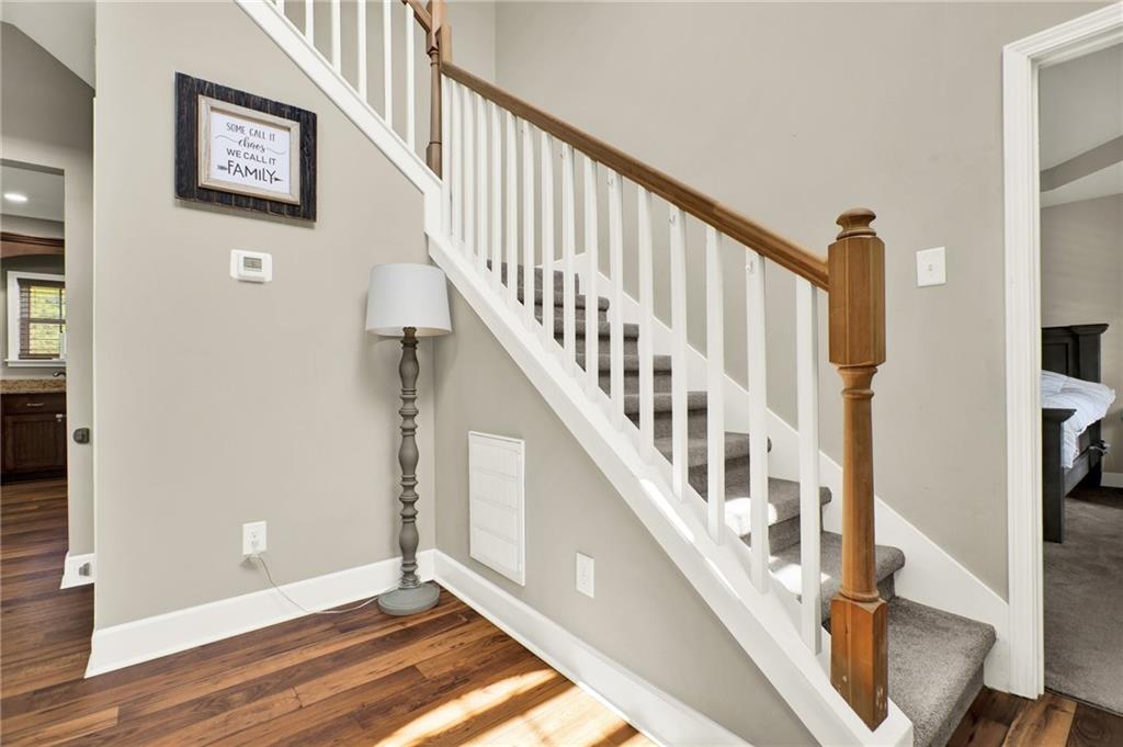 923 County Line Road Resaca, GA 30735 - Photo 29 of 49 a view of entryway with wooden floor and stairs