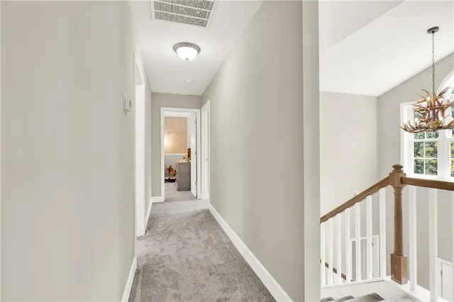 a bedroom with a bed and a cabinets