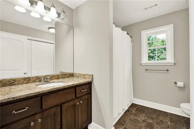 a bed room with furniture and a window