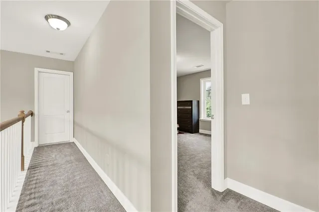 a view of a workspace with furniture