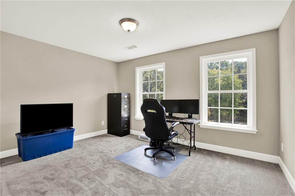 923 County Line Road Resaca, GA 30735 - Photo 36 of 49 a view of a livingroom with workspace and a window