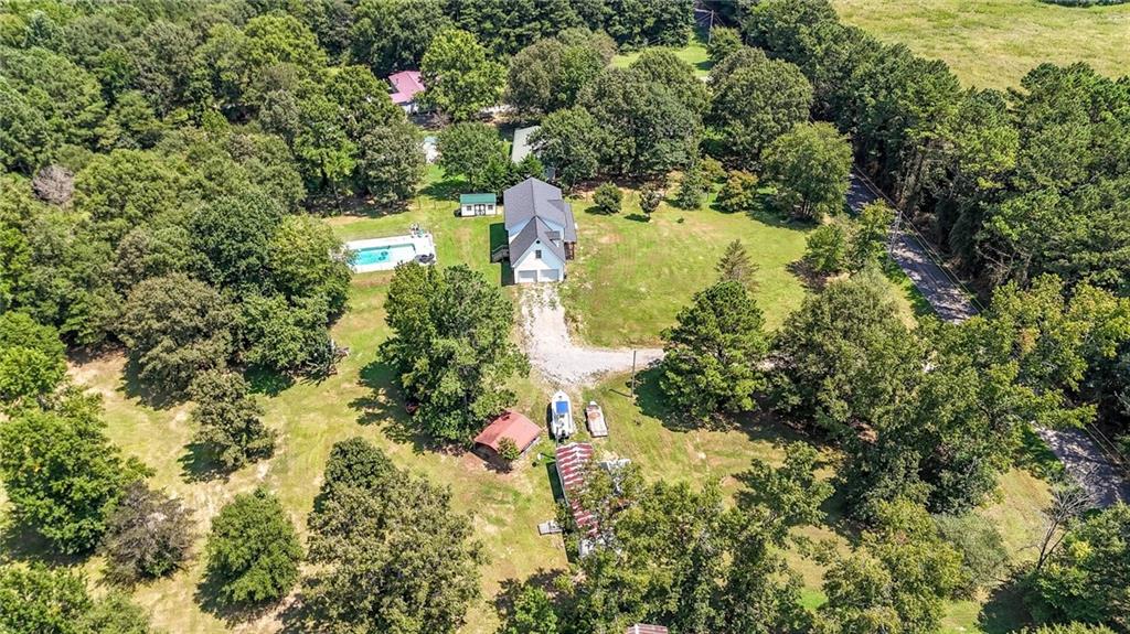 923 County Line Road Resaca, GA 30735 - Photo 40 of 49 a view of a lake with large trees