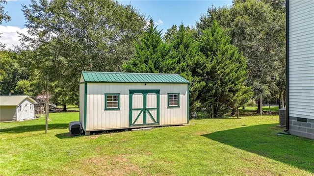 a view of a backyard with a garden