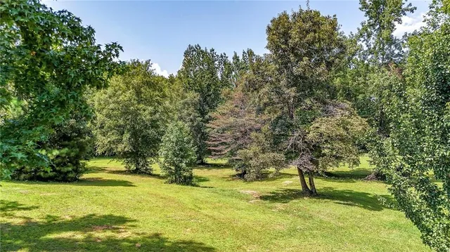 a picture of a bathroom with a shower