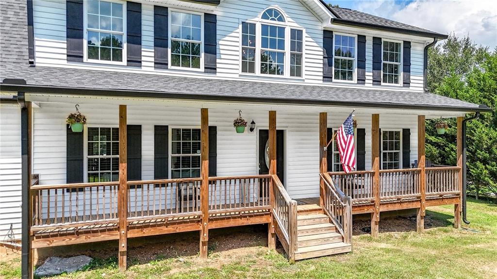 923 County Line Road Resaca, GA 30735 - Photo 5 of 49 a view of a house with a small deck