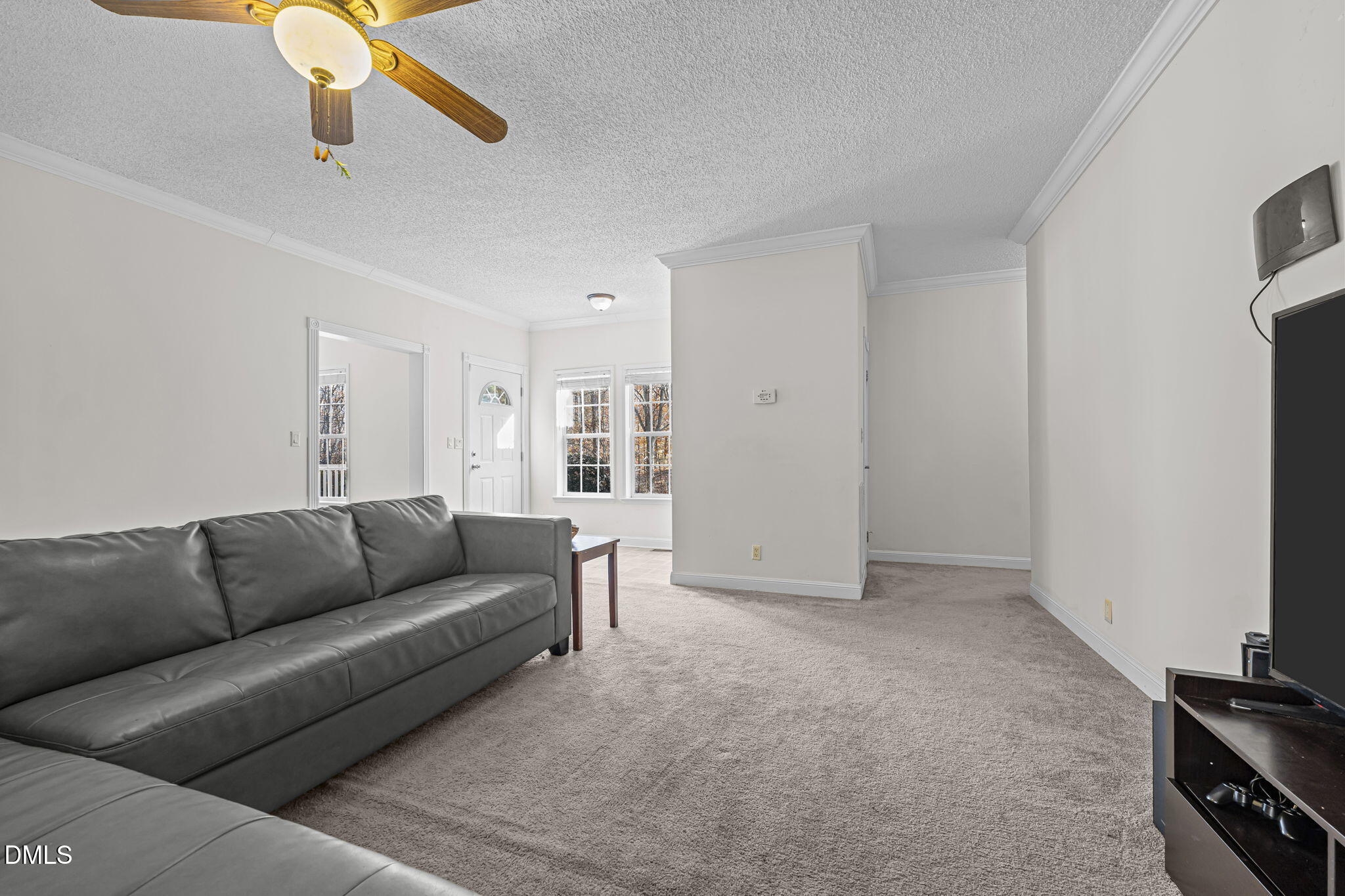 4501 Foreys Court Graham, NC 27253 - Photo 13 of 47 a living room with furniture and a flat screen tv