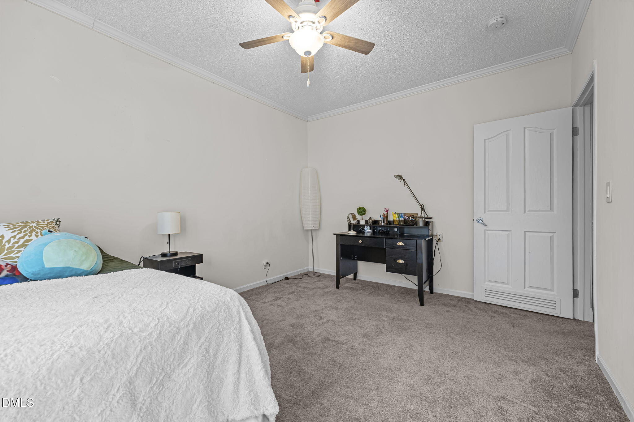 4501 Foreys Court Graham, NC 27253 - Photo 23 of 47 a bedroom with bed and a chandelier