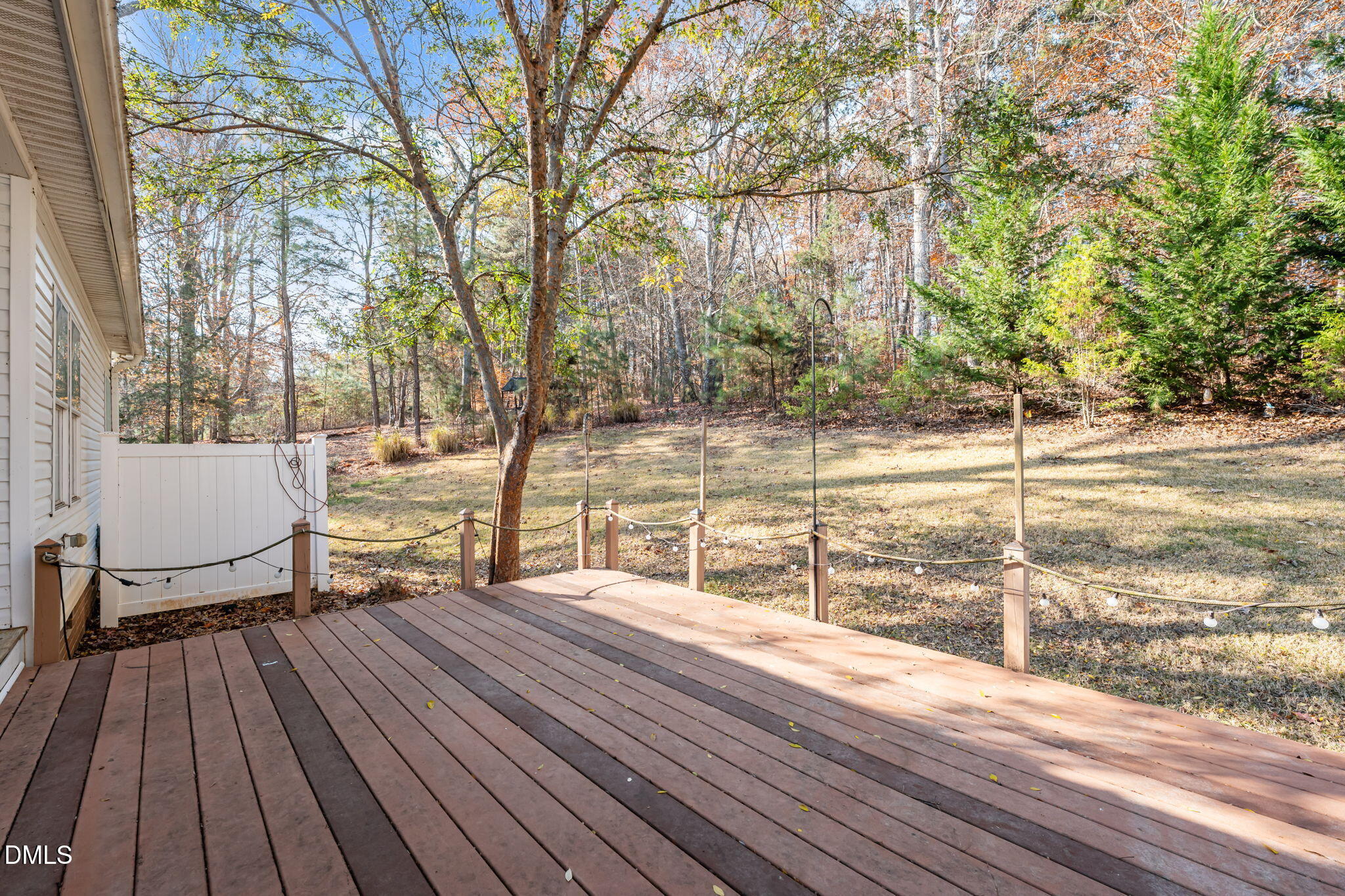 4501 Foreys Court Graham, NC 27253 - Photo 29 of 47 a view of a roof deck with wooden floor and fence