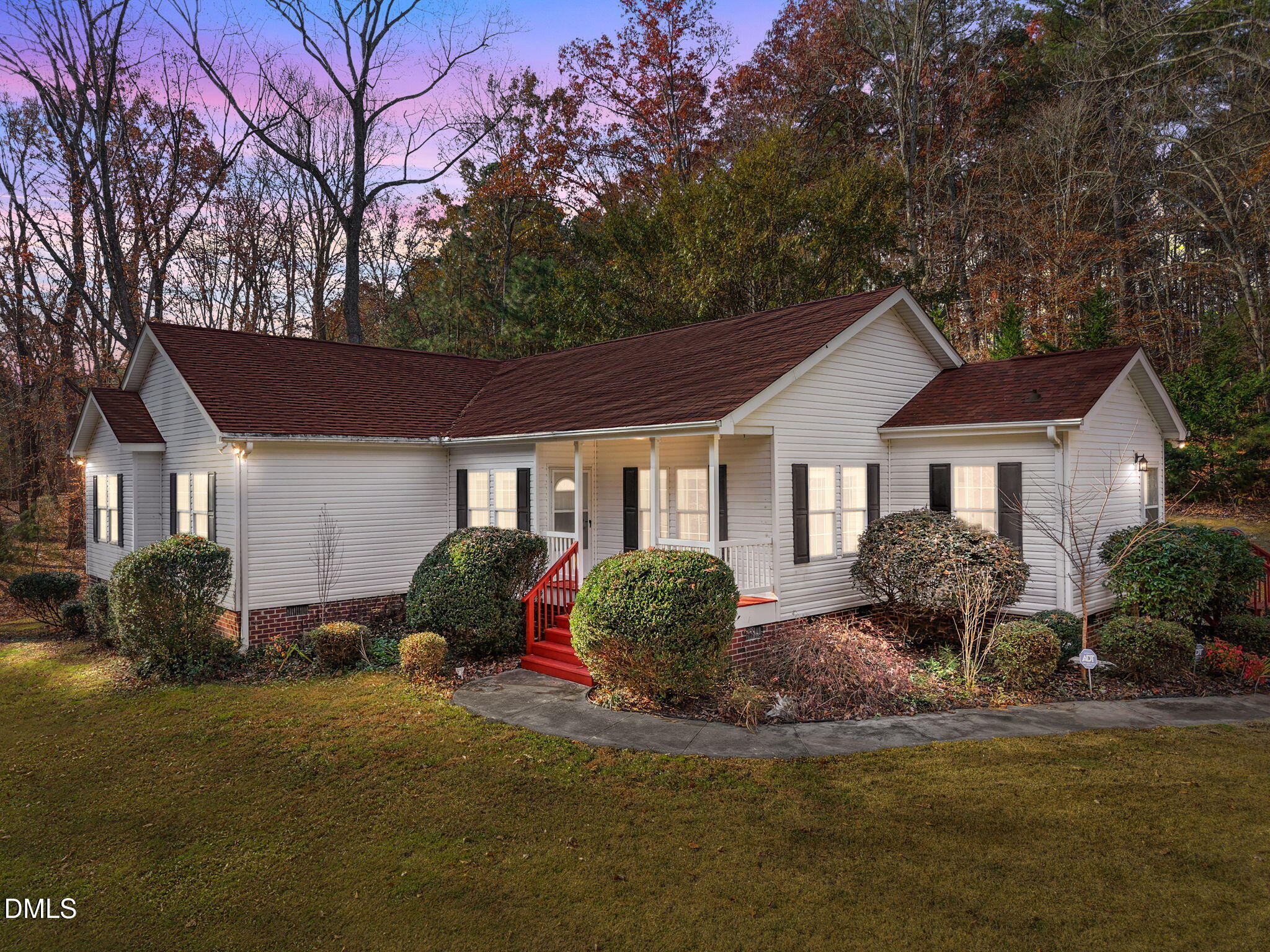 4501 Foreys Court Graham, NC 27253 - Photo 33 of 47 a front view of a house with garden