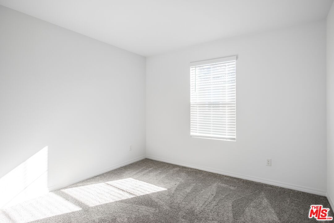 7935 Cold Creek Street Riverside, CA 92507 - Photo 23 of 45 a view of an empty room with a window