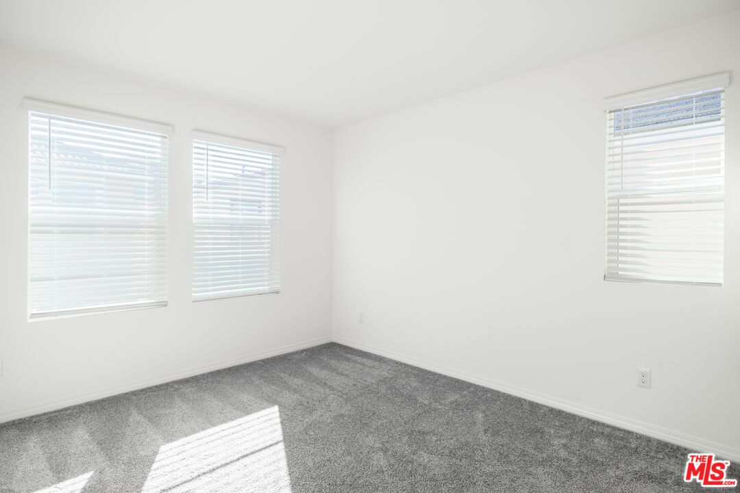 7935 Cold Creek Street Riverside, CA 92507 - Photo 25 of 45 an empty room with a window