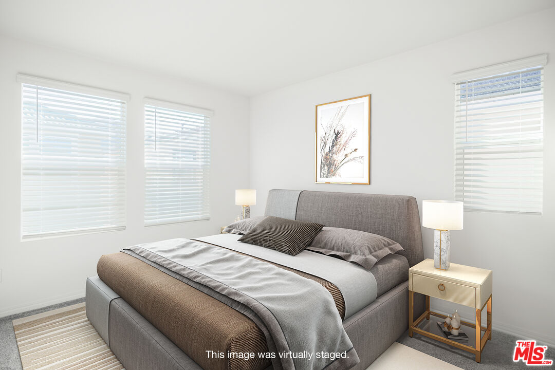 7935 Cold Creek Street Riverside, CA 92507 - Photo 26 of 45 a bedroom with a bed and a window