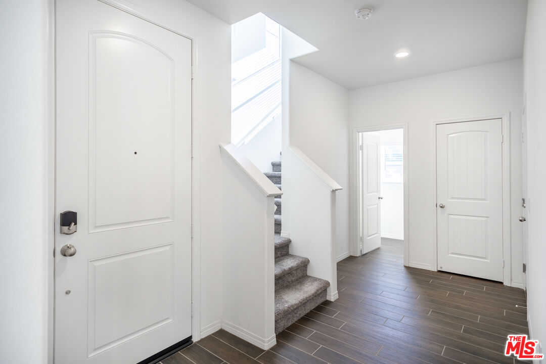 7935 Cold Creek Street Riverside, CA 92507 - Photo 4 of 45 a view of entryway with wooden floor