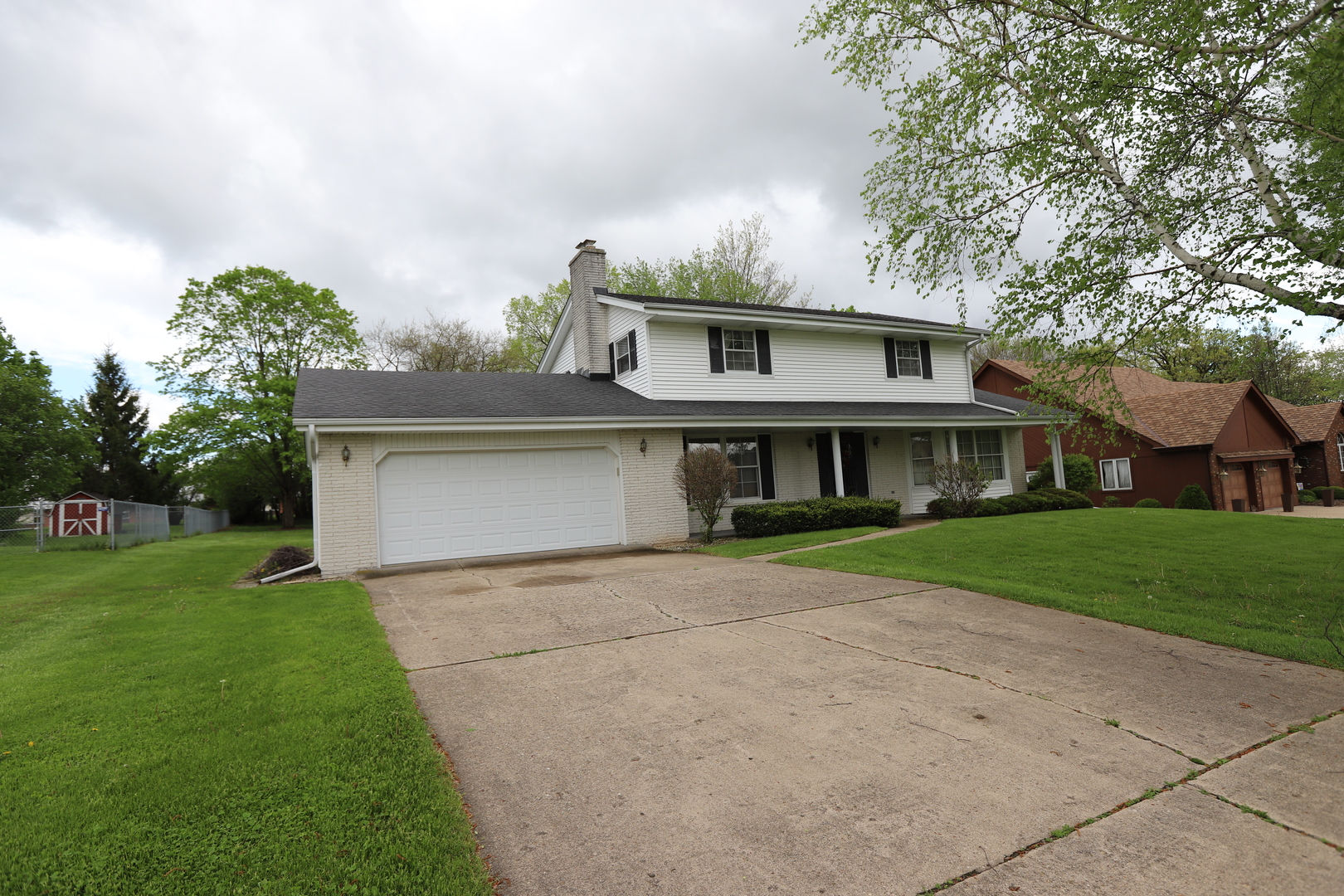 a view of house with outdoor space area