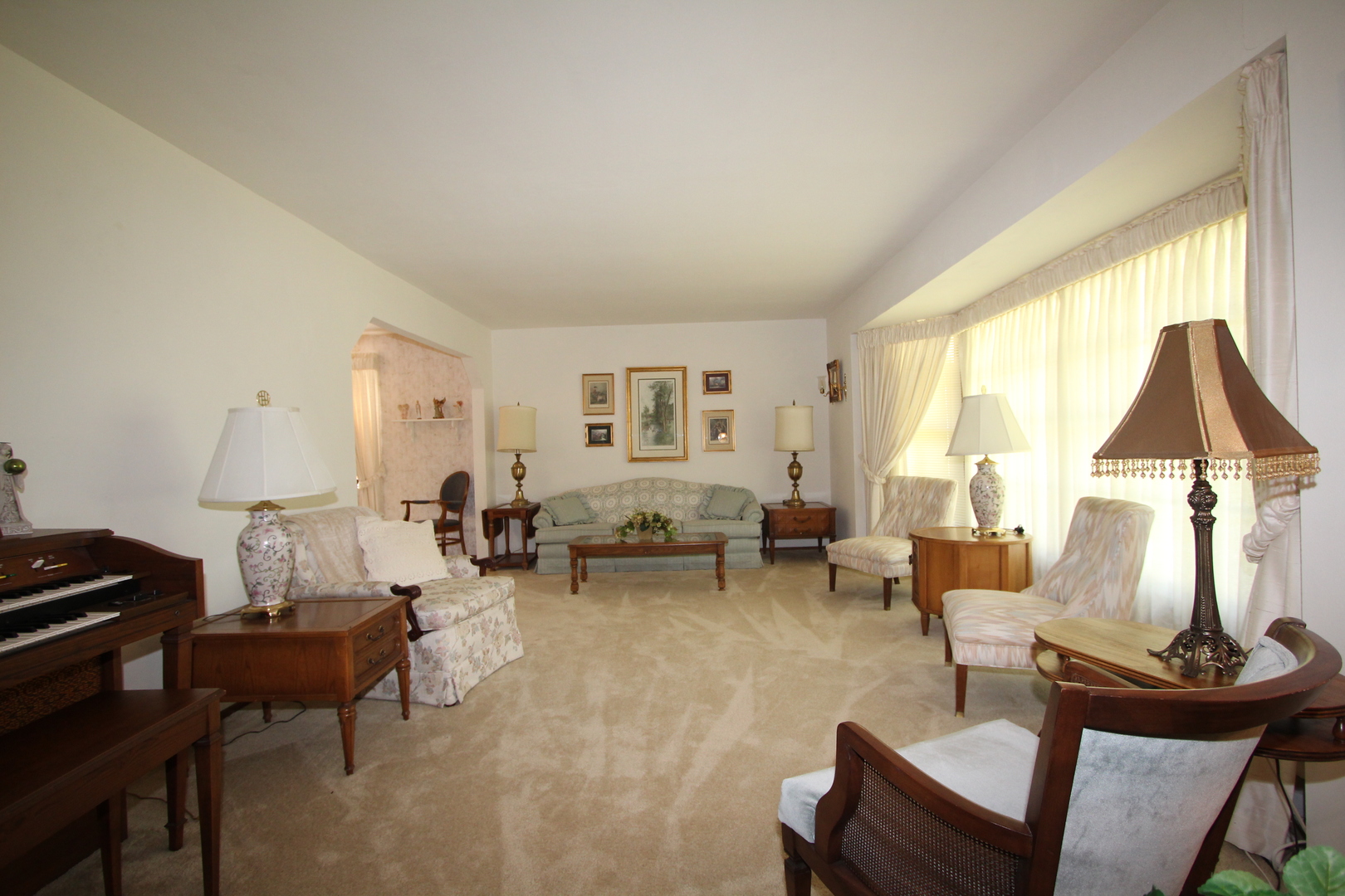 603 Old Orchard Road Harvard, IL 60033 - Photo 12 of 46 a living room with furniture and a large window