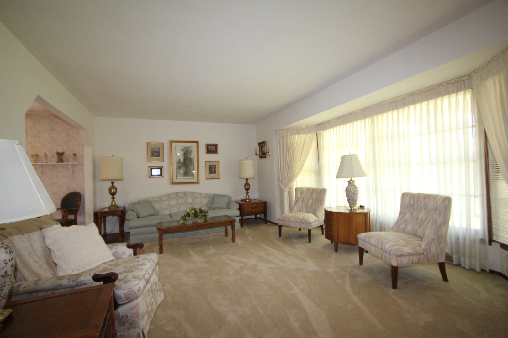 603 Old Orchard Road Harvard, IL 60033 - Photo 13 of 46 a living room with furniture and a large window