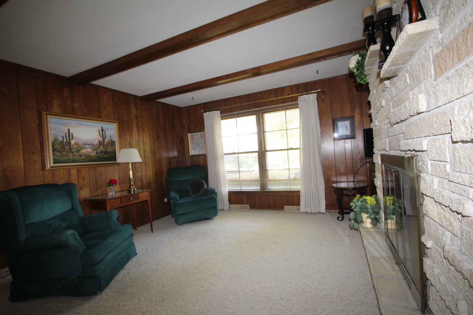 603 Old Orchard Road Harvard, IL 60033 - Photo 16 of 46 a living room with furniture and a flat screen tv