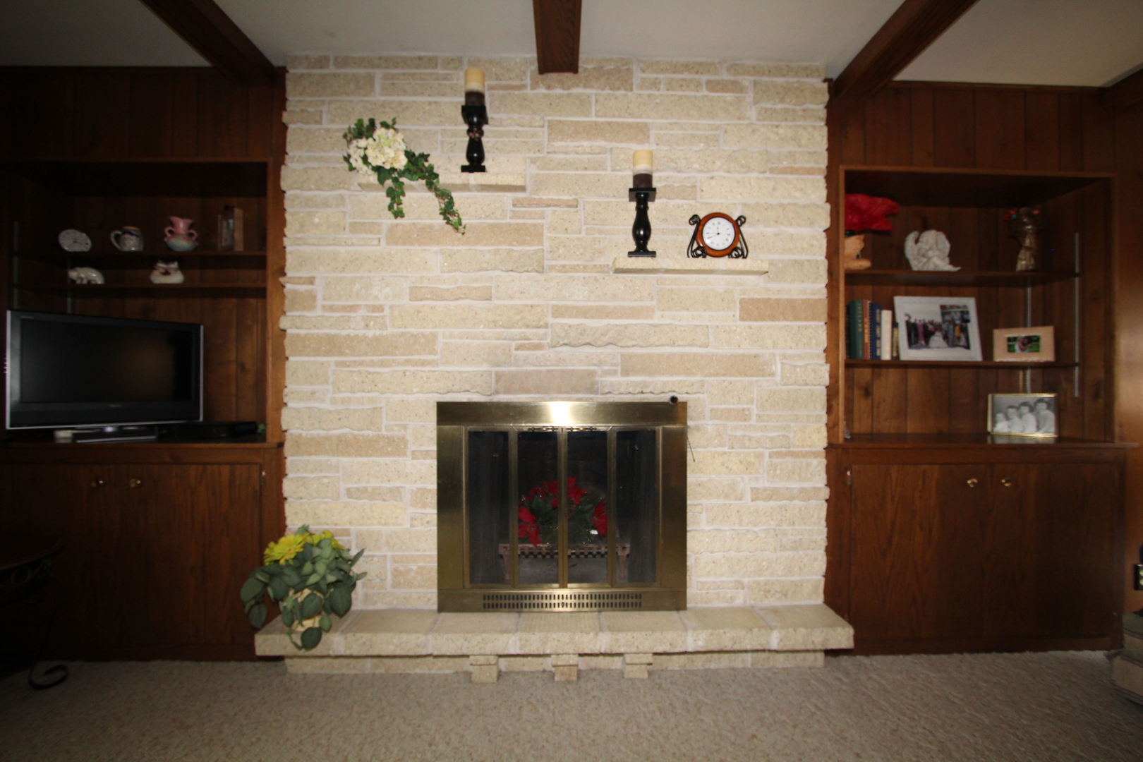 603 Old Orchard Road Harvard, IL 60033 - Photo 17 of 46 a living room with furniture and a fireplace
