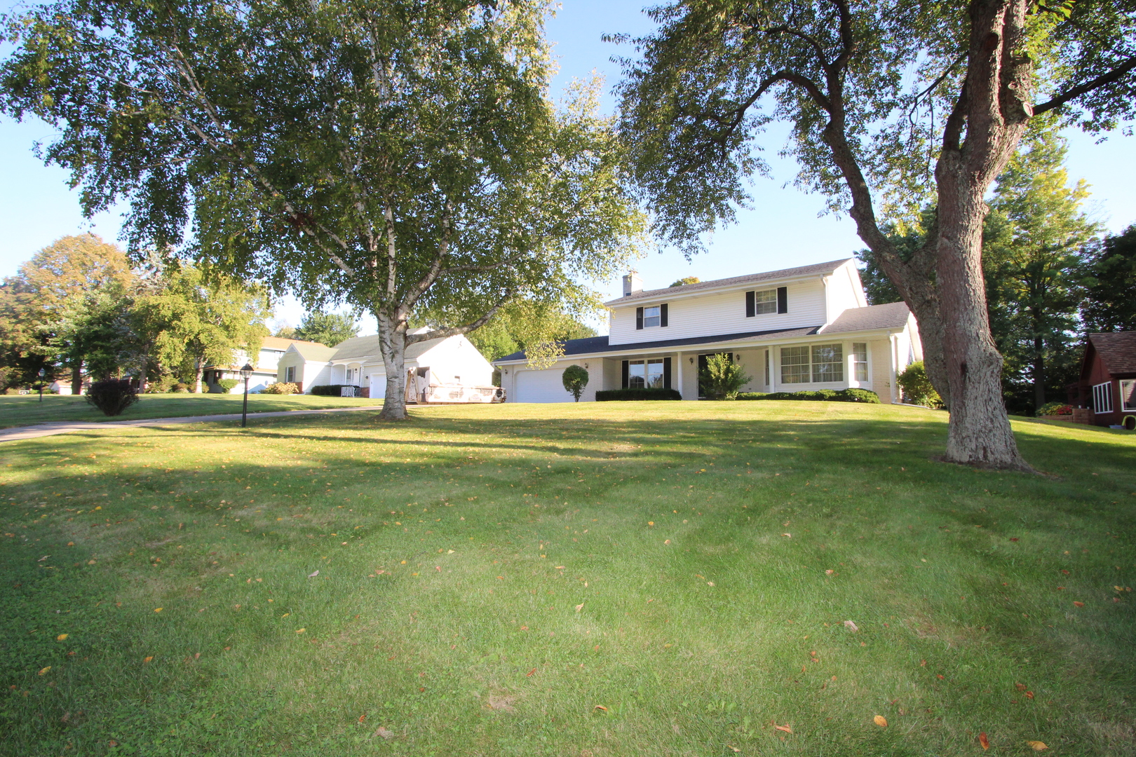 603 Old Orchard Road Harvard, IL 60033 - Photo 36 of 46 a house view with swimming pool