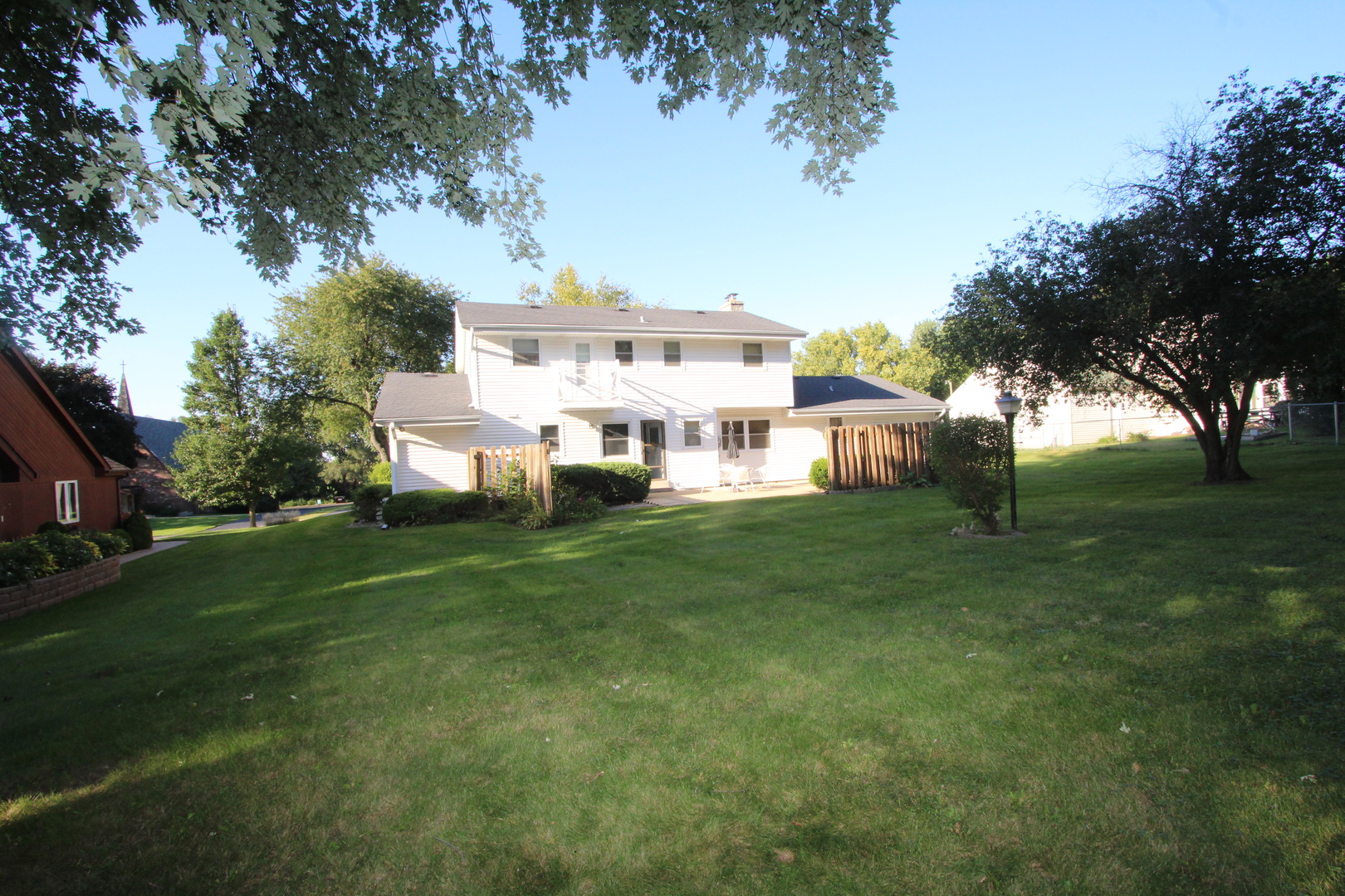 603 Old Orchard Road Harvard, IL 60033 - Photo 39 of 46 a view of a house with a yard