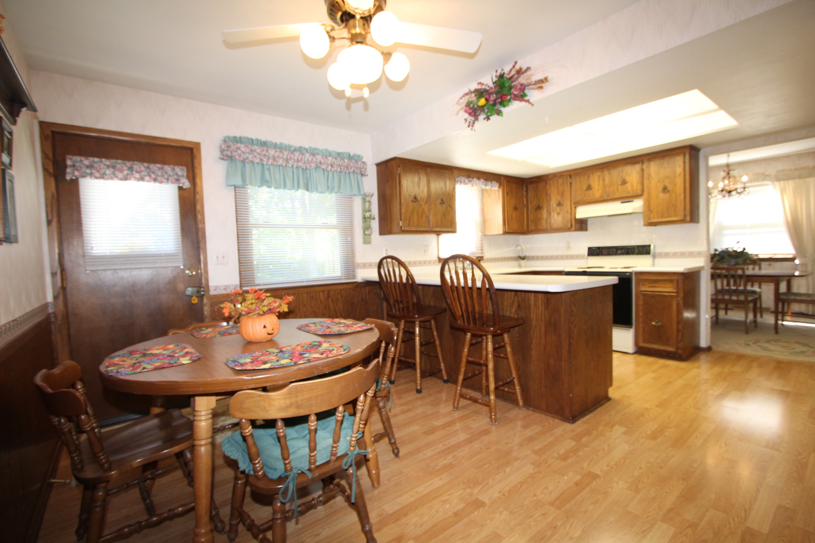 603 Old Orchard Road Harvard, IL 60033 - Photo 5 of 46 a view of a dining room with furniture and window