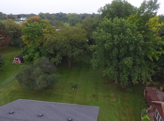 603 Old Orchard Road Harvard, IL 60033 - Photo 43 of 46 an aerial view of a house with a yard