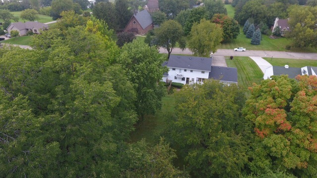 603 Old Orchard Road Harvard, IL 60033 - Photo 44 of 46 an aerial view of a house with a yard basket ball court and outdoor seating