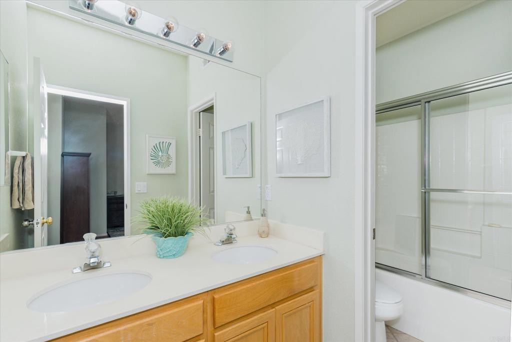 16350 Open View Road Ramona, CA 92065 - Photo 18 of 45 a bathroom with a sink and a mirror