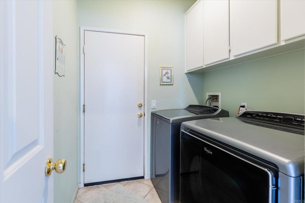 16350 Open View Road Ramona, CA 92065 - Photo 20 of 45 a utility room with dryer and washer