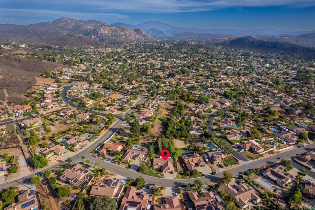 16350 Open View Road Ramona, CA 92065 - Photo 31 of 45 an aerial view of residential house and an ocean