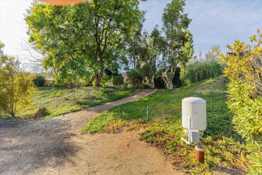16350 Open View Road Ramona, CA 92065 - Photo 36 of 45 a backyard of a house with a yard and outdoor seating