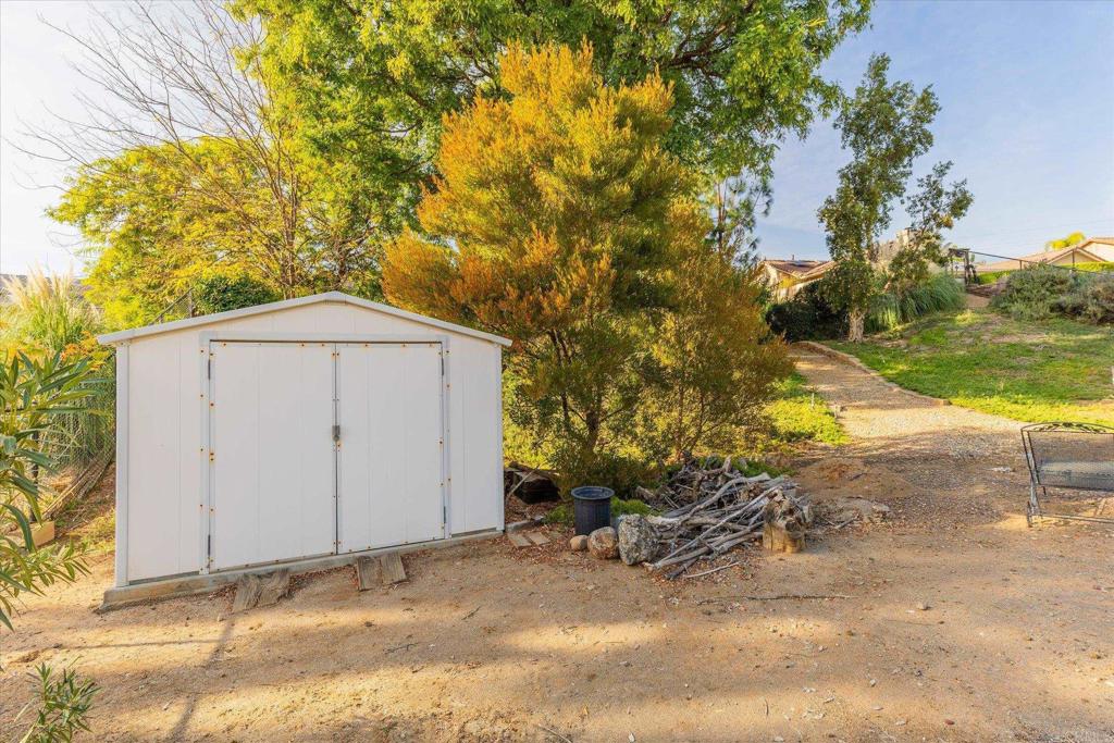 16350 Open View Road Ramona, CA 92065 - Photo 37 of 45 a view of backyard and tree