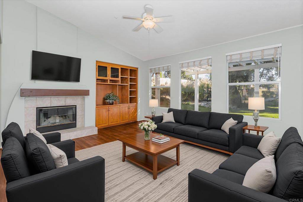 16350 Open View Road Ramona, CA 92065 - Photo 4 of 45 a living room with furniture fireplace and flat screen tv