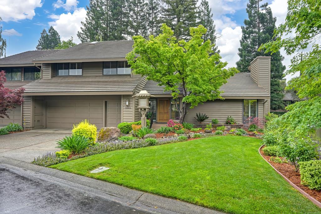7650 Pineridge Road Fair Oaks, CA 95628 - Photo 56 of 67 a front view of a house with a garden and plants