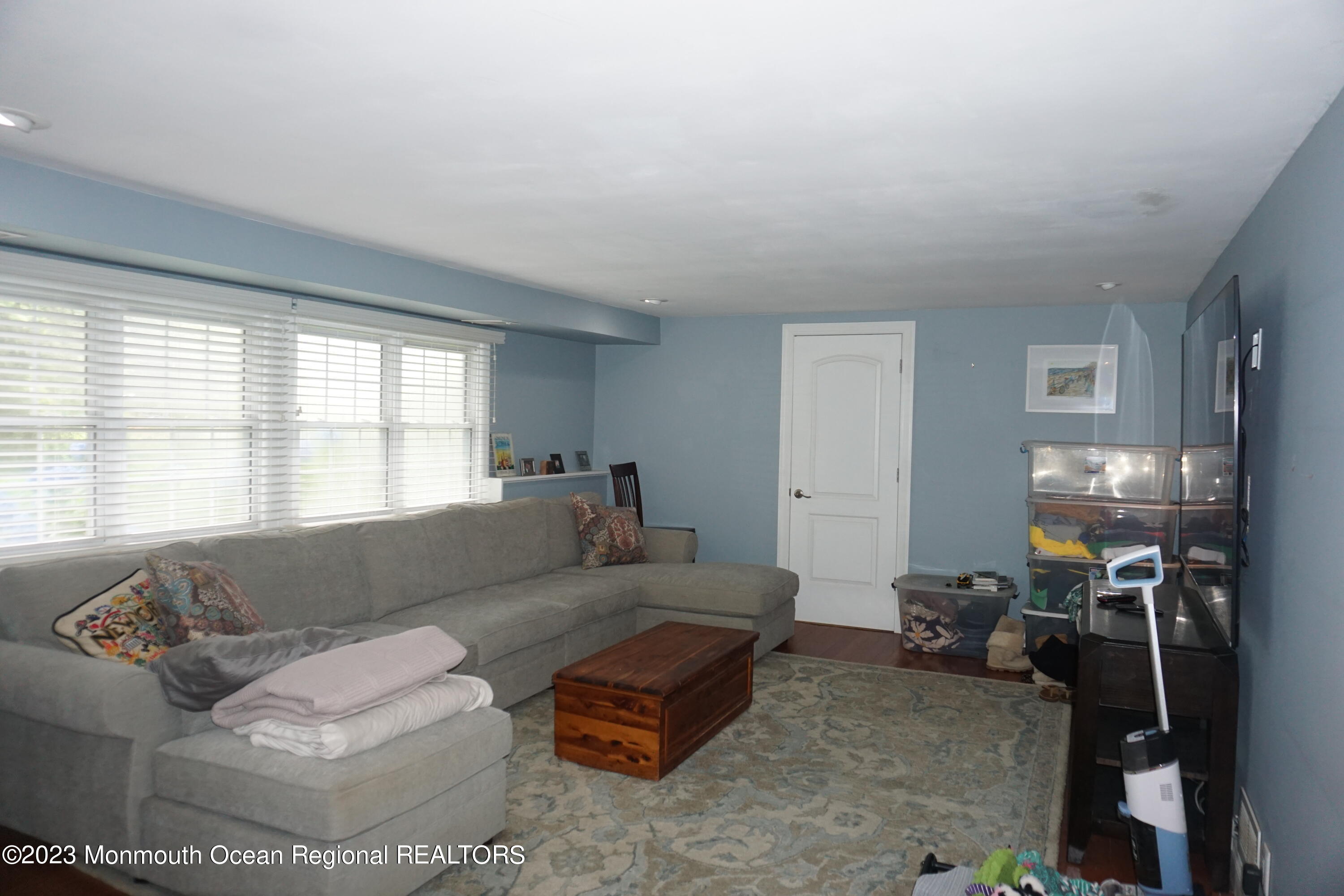 114 Bruce Road Red Bank, NJ 07701 - Photo 4 of 14 a living room with furniture and a large window