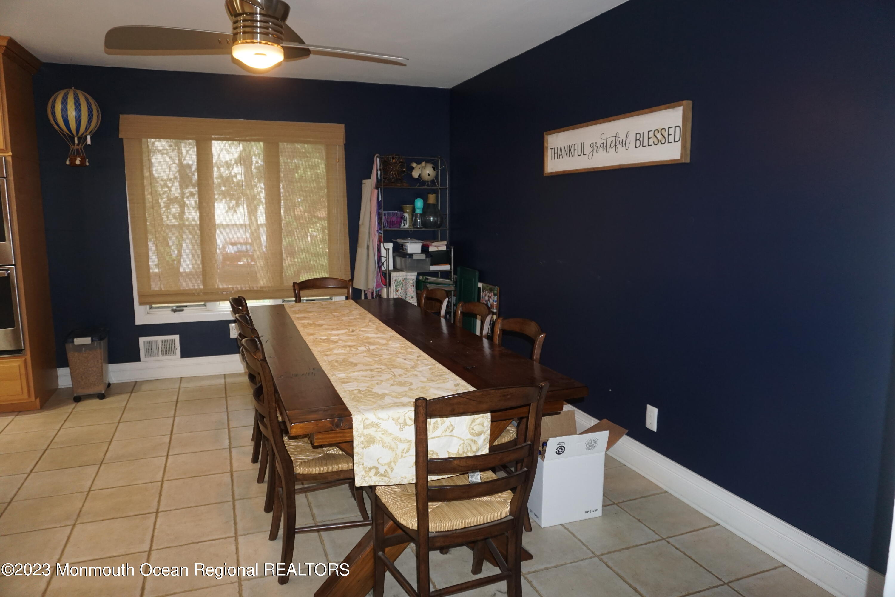 114 Bruce Road Red Bank, NJ 07701 - Photo 6 of 14 a view of a dining room with furniture and window