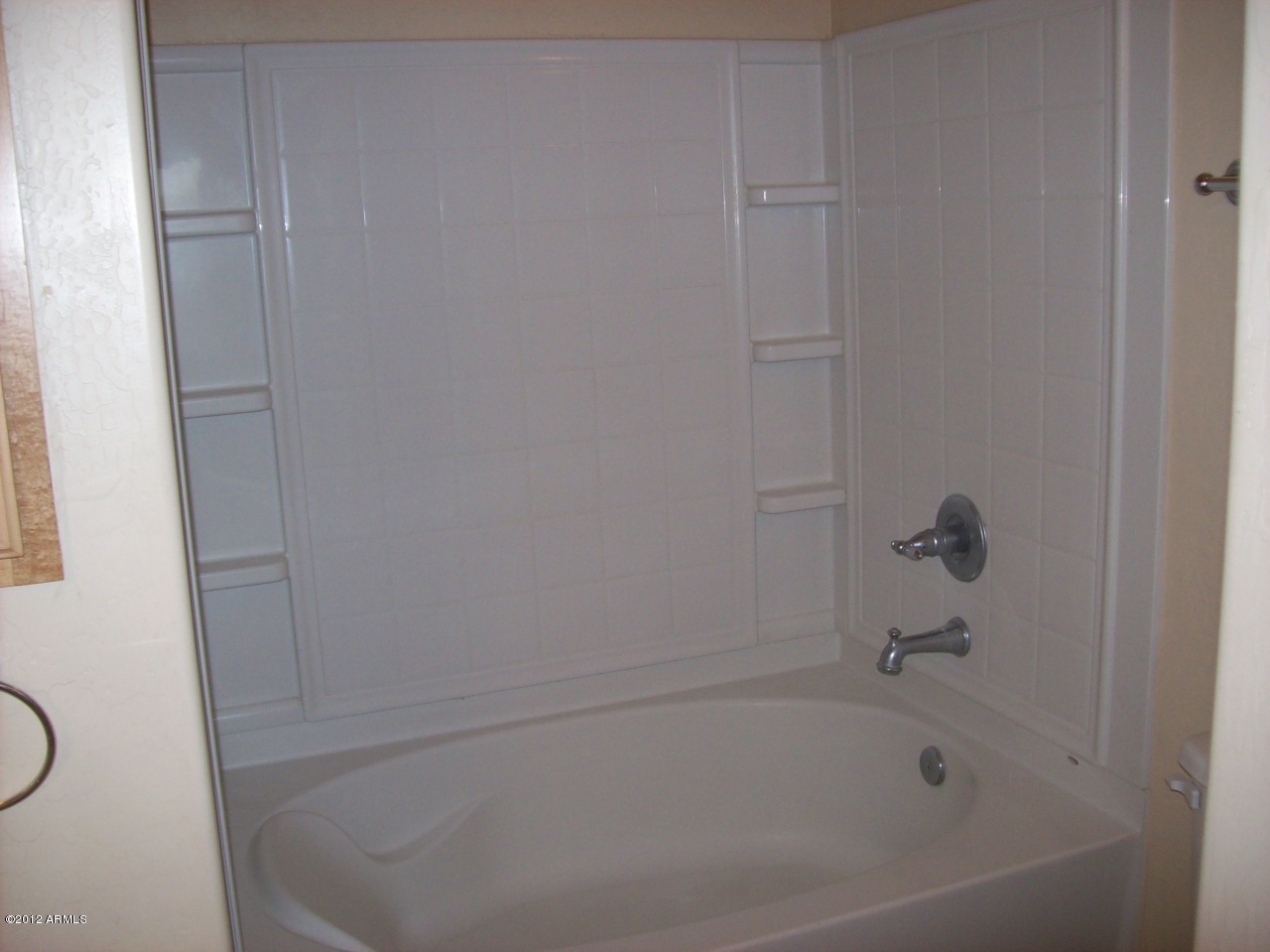 2565 South Signal Butte Road, Unit 39 Mesa, AZ 85209 - Photo 13 of 28 a close view of a bathtub in bathroom