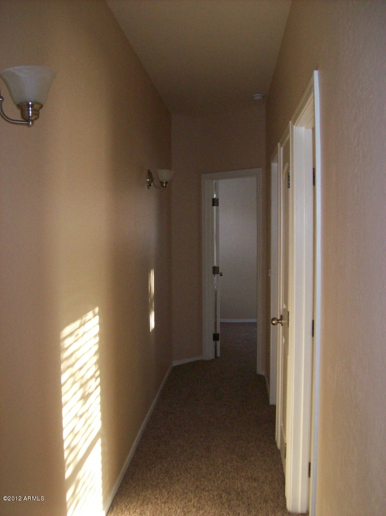 2565 South Signal Butte Road, Unit 39 Mesa, AZ 85209 - Photo 15 of 28 a view of a room that has a window in it