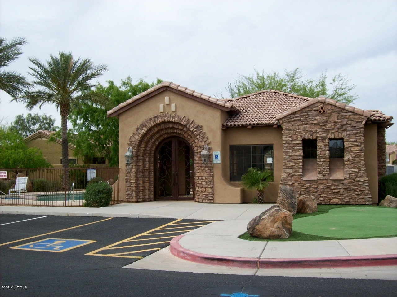 2565 South Signal Butte Road, Unit 39 Mesa, AZ 85209 - Photo 23 of 28 a view of a house with a yard